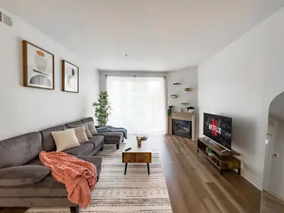 a living room with a couch and a fireplace at Stylish 1bd in Marina Del Rey with Free Parking in Los Angeles