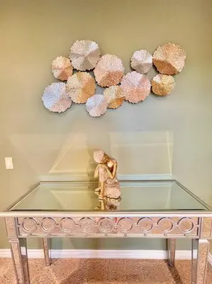a figurine on a glass table with umbrellas on the wall at Stunning Panoramic Waterfront Pool Home Escape in Anaheim