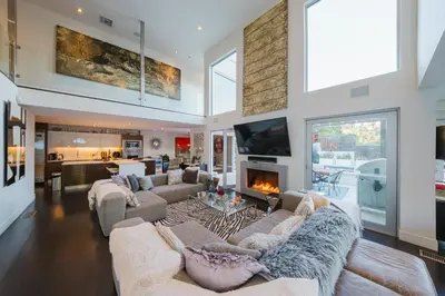 a large living room with couches and a fireplace at Casa Azul in Los Angeles