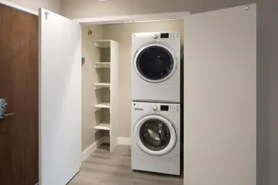 a laundry room with a washer and dryer at Beachside Luxury Apartment I Free Parking in Los Angeles