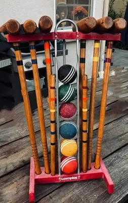 a stand of baseball bats and balls on a deck at Family-friendly, AC, Hot Tub, Walk 2 Park & Lake in Big Bear Lake