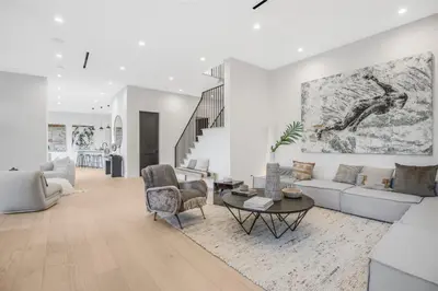 a living room with a couch and a table at Belden Modern Villa in Los Angeles