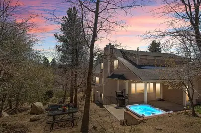 a house with a swimming pool in front of it at Oak Mountain Retreat, Hot Tub, & BBQ, Game Room! in Lake Arrowhead