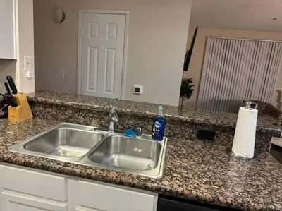 a kitchen counter with a sink in a kitchen at Travel Haven at Miracle Mile- 110 in Los Angeles