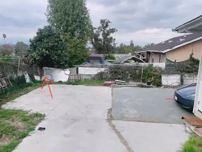 a driveway with a kite in a yard at private & Quiet unit D Bed & bath in Rosemead