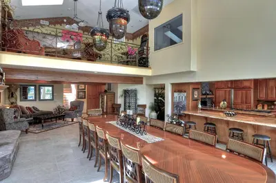 a large room with a long table and chairs at No. 8 Estate By The Lake in Big Bear Lake