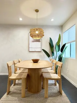 a dining room with a wooden table and chairs at Bohemian Dream- 2BR, Retreat Near Hollywood -BR6 in Los Angeles