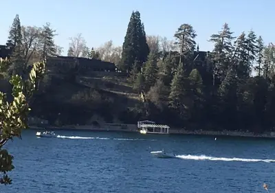 a boat in the water on a lake at Bugsy's Hideout in Lake Arrowhead