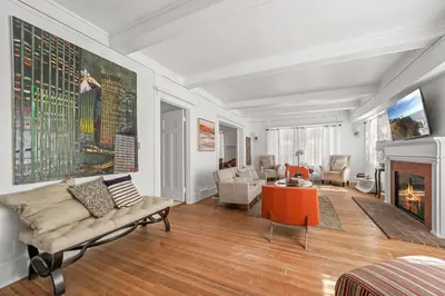 a living room with a couch and a fireplace at Spacious Chic 5 Bedroom Perfect for Large Group With parking in Los Angeles