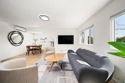 a living room with a couch and a table at 2Bedroom home - Marengo Estate in Alhambra