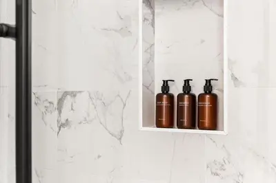 three oxygen bottles sitting on a shelf in a bathroom at 2Bedroom home - Marengo Estate in Alhambra