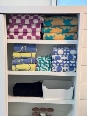 a closet filled with lots of different colored towels at Architectural Marvel in Hollywood Hills with Views in Los Angeles