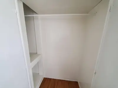 an empty closet with white walls and a wooden floor at Hollywood - Budget Private Quiet 2nd Flr 1BR and 1BA in Los Angeles