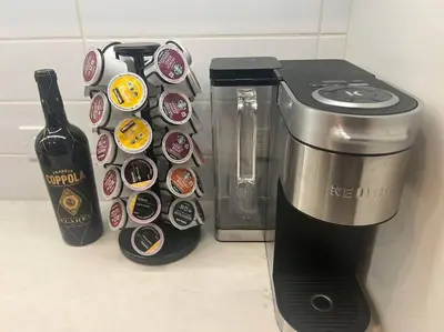 a coffee maker next to a bottle of wine at Luxe Corner One Bedroom, Prime Hollywood with Parking in Los Angeles