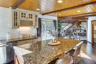 a kitchen with a large counter top in a room at Lake Arrowhead Cabin 4 Decks, Game Room and More! in Lake Arrowhead