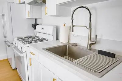 a kitchen with a sink and a stove at Cozy Private Studio in Granada Hills Near CSUN, Universal in Mission Hills