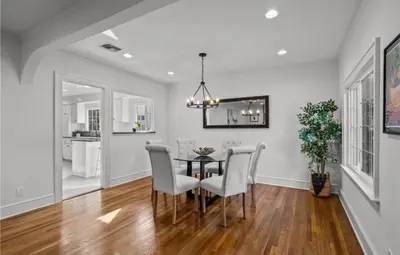 a dining room with a table and chairs at Modern 2-Bedroom in Santa Moinca Area Close to UCLA in Los Angeles