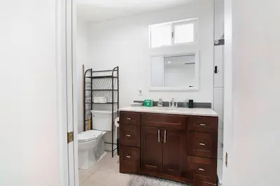 a bathroom with a sink and a toilet at Updated 3-Bedroom LA Home with Backyard, BBQ & Family-Friendly Amenities in Los Angeles
