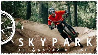 a man riding a bike on a dirt trail at Cocos Cottage Getaway Running Springs in Running Springs