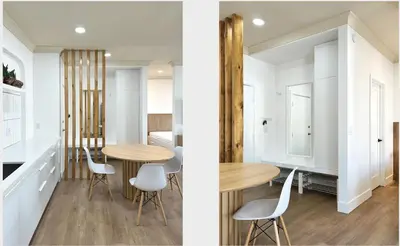 a kitchen and a dining room with a table and chairs at Broskin apartments in Los Angeles