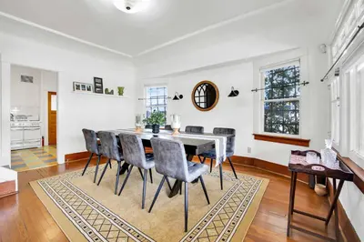 a dining room with a table and chairs at Classic Home Near Downtown & Hollywood in Los Angeles