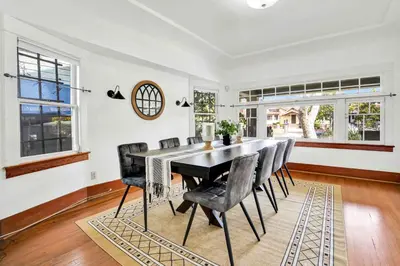 a dining room with a table and chairs at Classic Home Near Downtown & Hollywood in Los Angeles