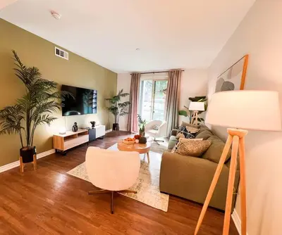 a living room with a couch and a table at Cozy Apartment in Heart of Encino 104 in Encino