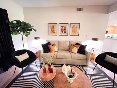 a living room with a couch and a table at Beautiful 2 BD 3 Beds in Heart of Encino 105 in Encino
