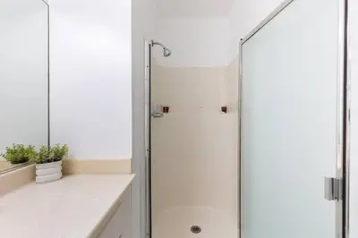 a shower with a glass door in a bathroom at Sunny 1 Bedroom in the Heart of Venice Beach - #1 in Los Angeles