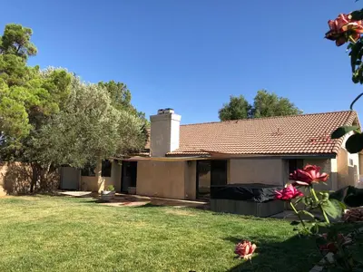 a house with a yard in front of it at Oasis Hm near Rancho Vista- Shared Hm in Palmdale