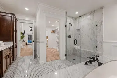a bathroom with a shower and a bath tub at Belmont Beverly Hills by Stay Awhile Villas in Los Angeles