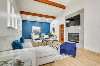 a living room with a couch and a fireplace at Lake Arrowhead Hideaway with Deck and Hot Tub in Lake Arrowhead