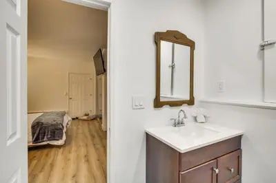a bathroom with a sink and a mirror at 2 Mi to Water Lake Arrowhead Studio in Lake Arrowhead