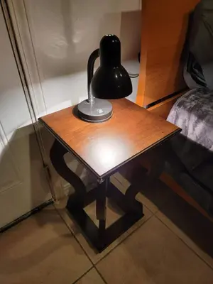 a lamp sitting on a table next to a bed at Private guest studio 5 minutes to Rodeo Drive and in great area in Los Angeles