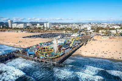 an aerial view of a beach with a roller coaster at 15 City View Santa Monica in Los Angeles