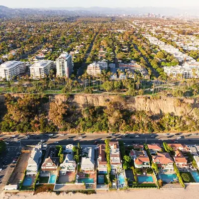 an aerial view of a parking lot with condos at 15 City View Santa Monica in Los Angeles