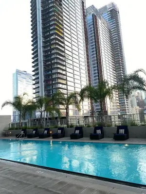 a swimming pool in a city with tall buildings at Elegant Luxury 1 Bedroom studio in Downtown LA in Vernon