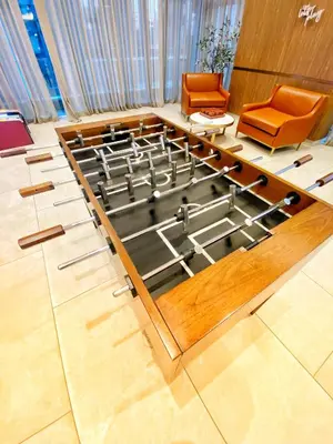 a room with a group of tables and chairs at Elegant Luxury 1 Bedroom studio in Downtown LA in Vernon