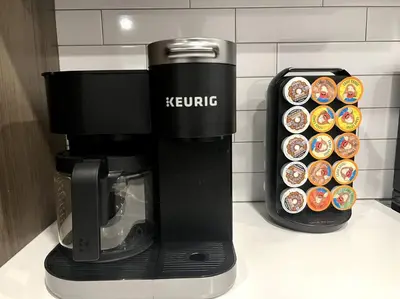 a k cup coffee maker with a dozen donuts at Silver Lake Stylish Penthouse One Bdrm with Parking included in Los Angeles