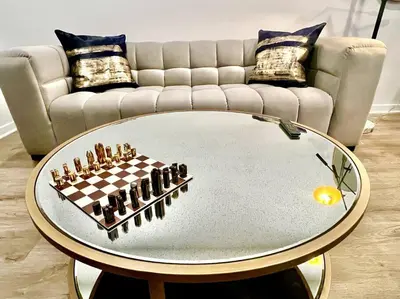 a chess board on a table in front of a couch at Silver Lake Stylish Penthouse One Bdrm with Parking included in Los Angeles