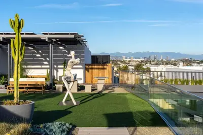 a garden with a statue on a roof at The Pearl Coast - Rooftop Pool, Gym Luxurious 2BR Santa Monica in Los Angeles
