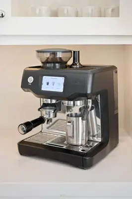 a black coffee maker sitting on a counter at Chateau Beverly Hills by Stay Awhile Villas in Los Angeles
