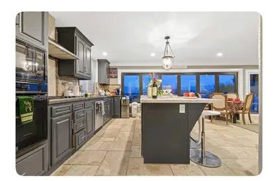 a kitchen with a island in the middle of a room at LA Million dollar VIEW super spacious 5 bedroom home in Hacienda Heights