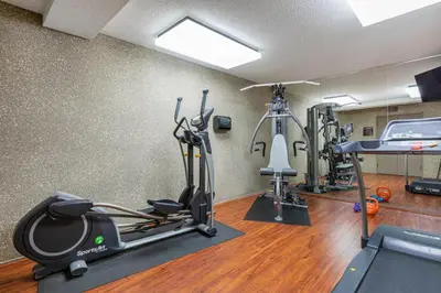 a gym with tread machines and a treadmill at Blueground N Hollywood Gym Pool nr shops LAX-515 in Los Angeles