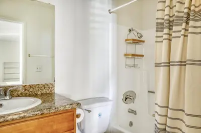 a bathroom with a toilet and a sink and a shower at Blueground N Hollywood Gym Pool nr shops LAX-515 in Los Angeles