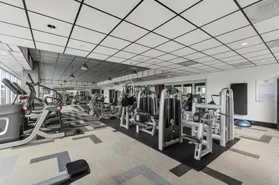 a gym with lots of treadmills and machines at Hollywood Designer Apartment in Los Angeles