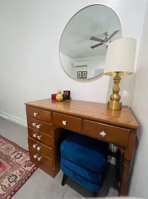 a desk with a mirror and a lamp on it at Great Private Studio in Noho in Los Angeles