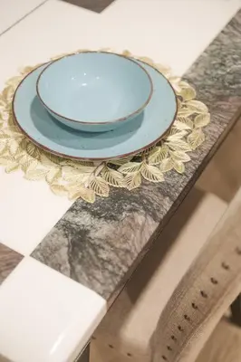 a plate sitting on top of a table at 2 TVs - Vaulted Ceiling - Private Kitchen & Entrance in Walnut