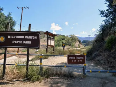 a sign for the wisel wood canyon state park at The Surf Retreat in Newbury Park