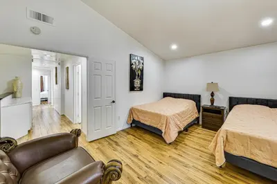 a bedroom with two beds and a couch at 2 Mi to Victoria Gardens Rancho Cucamonga Haven in Rancho Cucamonga